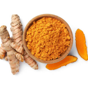 Bowl with aromatic turmeric powder and raw roots isolated on white, top view