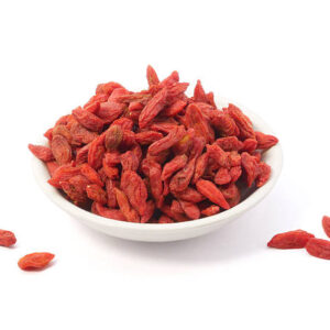 Dried goji berries in bowl isolated on white background